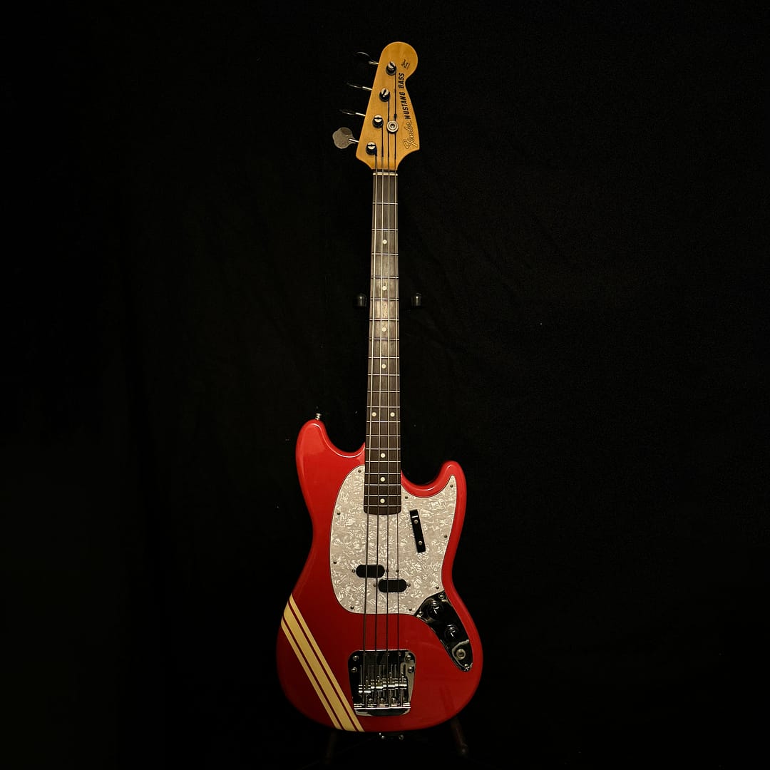 Fender Mustang Bass MB98 CIJ in Fiesta Red with vintage white racing stripes, short scale Japanese reissue