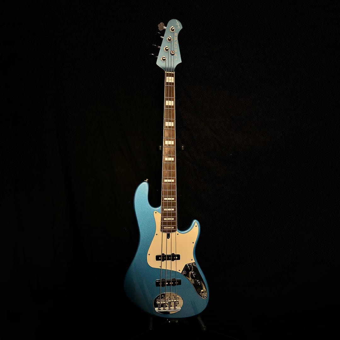 Lakland Skyline Darryl Jones DJ4 Bass in Lake Placid Blue with matching headstock and block inlays