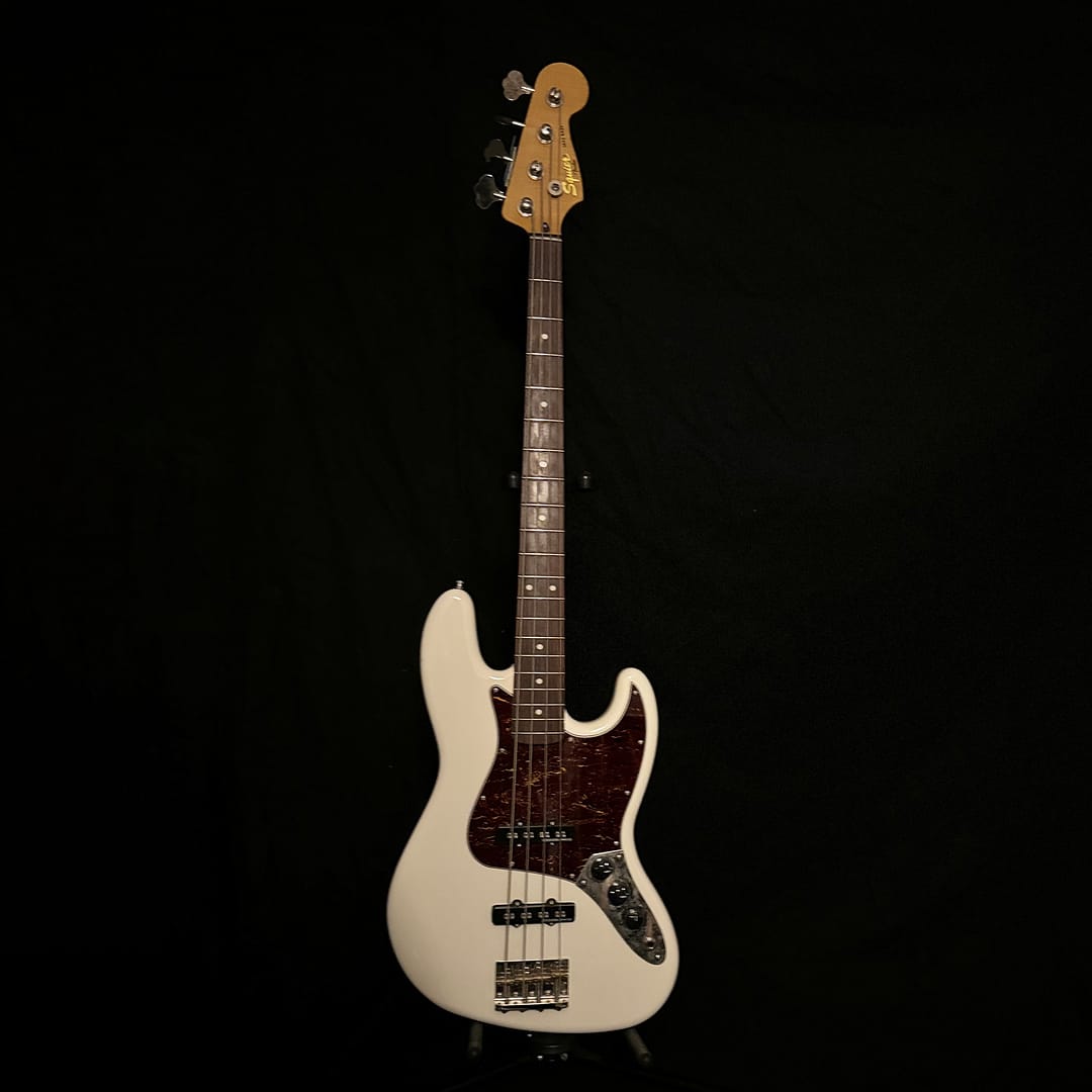 1st Generation Squier Classic Vibe '60s Jazz Bass in Olympic White, legendary Gold Logo run with rosewood fingerboard