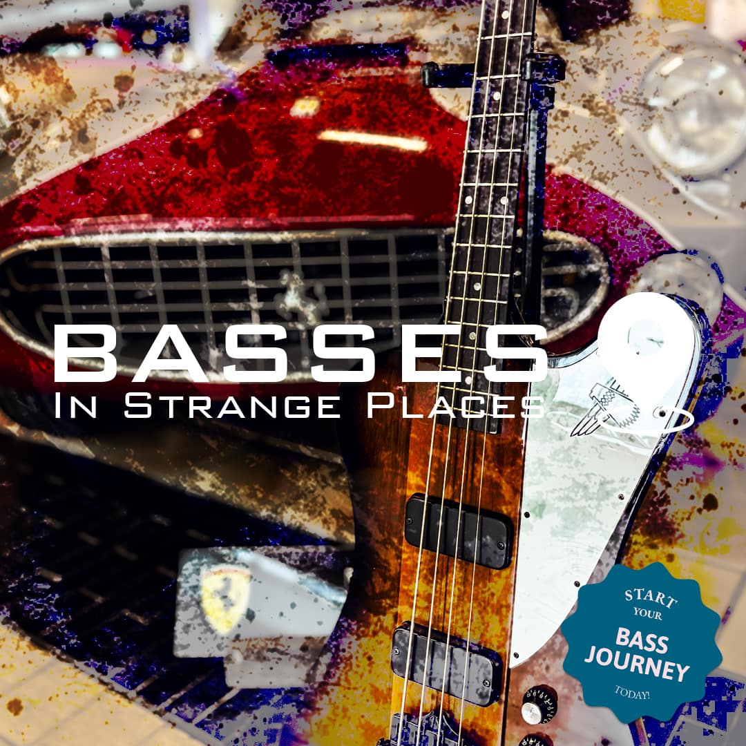 Vintage bass guitar displayed among a classic car collection at Strøjer Samlingen