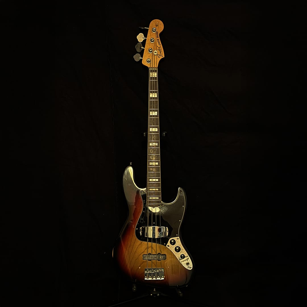 Vintage 1974 Fender Jazz Bass in 3-Color Sunburst with white bound neck and pearl block inlays